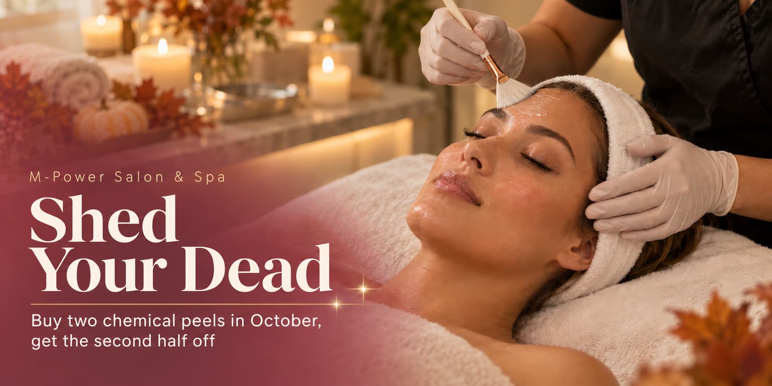 Esthetician's gloved hands applying a chemical peel with a fan brush to a relaxed client in a candlelit fall spa